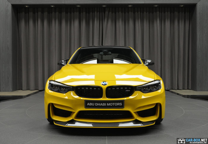 Желтый BMW M3 с капотом и спойлером от M4 GTS